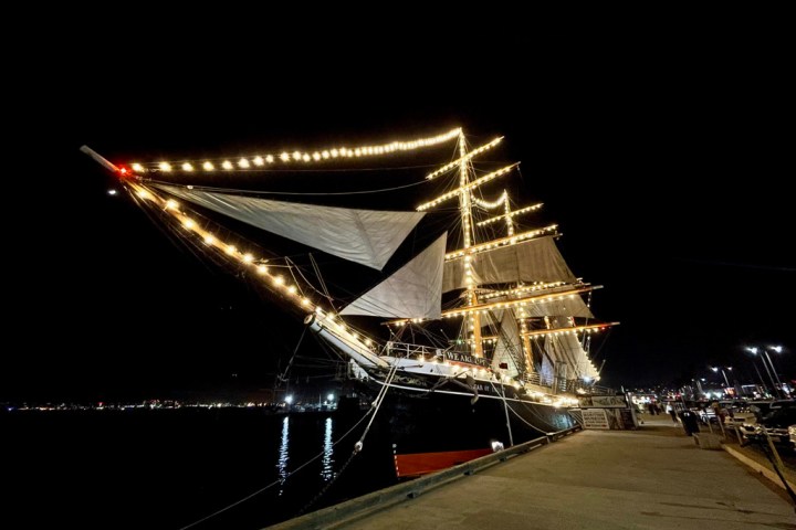 a close up of a light house at night