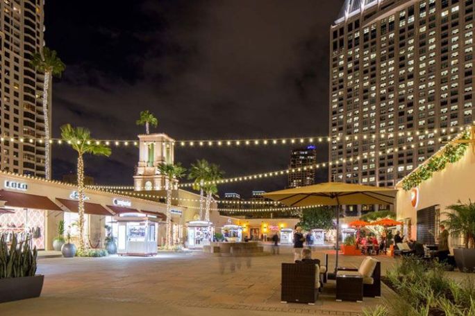 a group of people standing in front of a building
