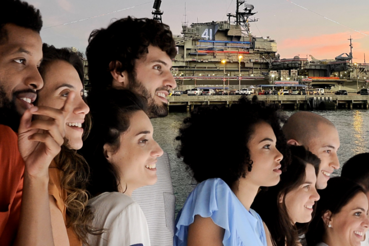 a group of people posing for the camera