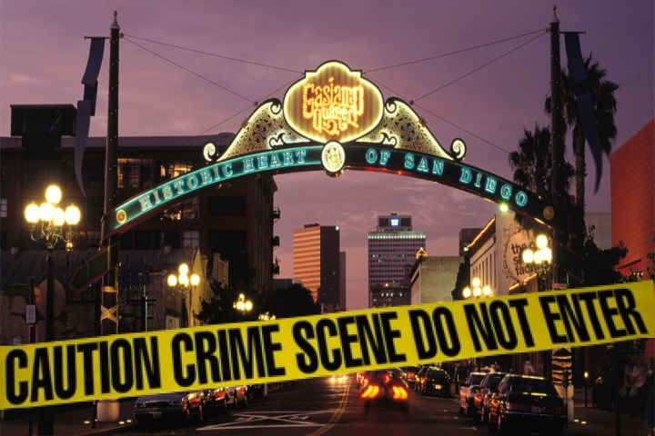 a sign above a store at night