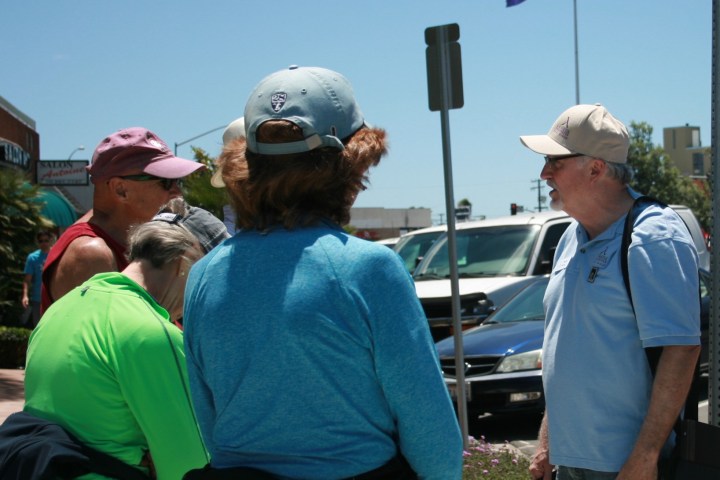 a group of people standing in front of a crowd