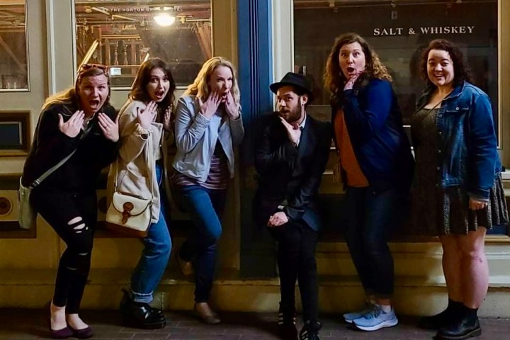 a group of people posing for the camera