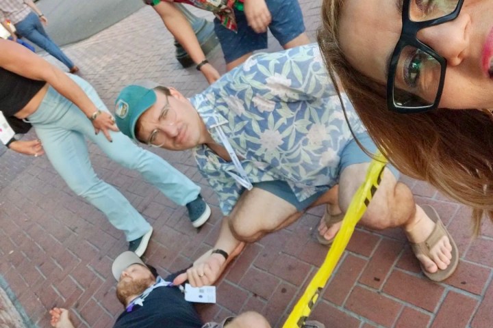 a group of people sitting on the ground