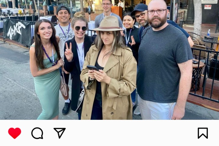 a group of people standing in front of a crowd