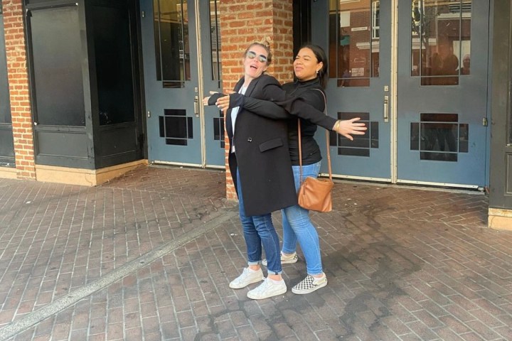 a person standing in front of a building