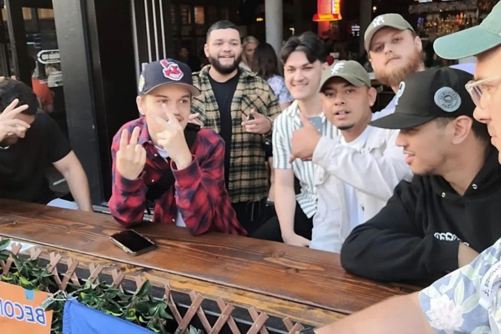 a group of people sitting at a table