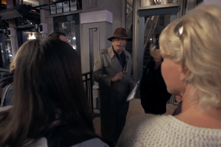 a woman standing in a kitchen