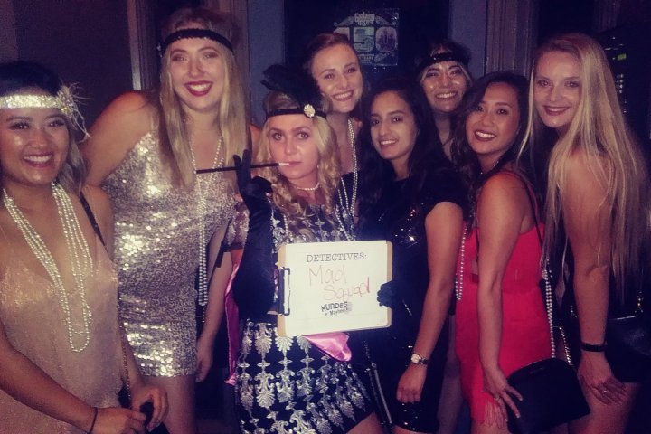 a group of people posing for a photo