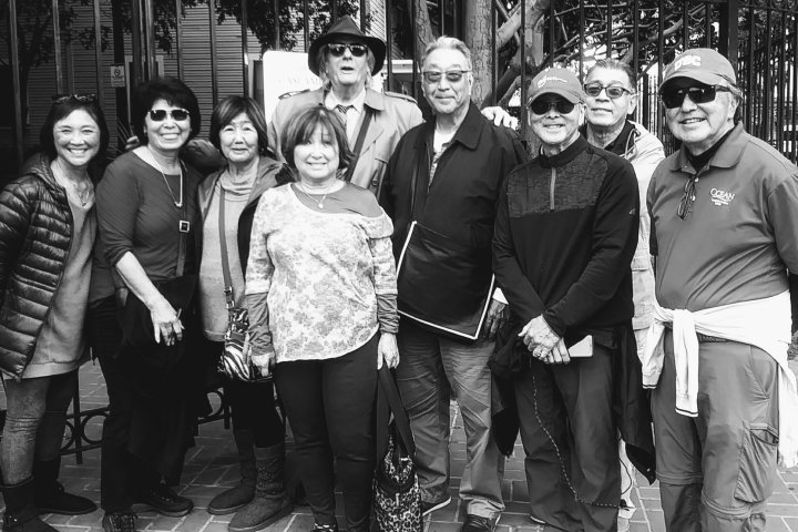 a group of people posing for a photo