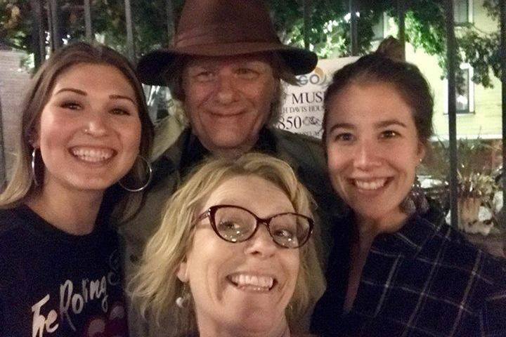 a group of people posing for the camera