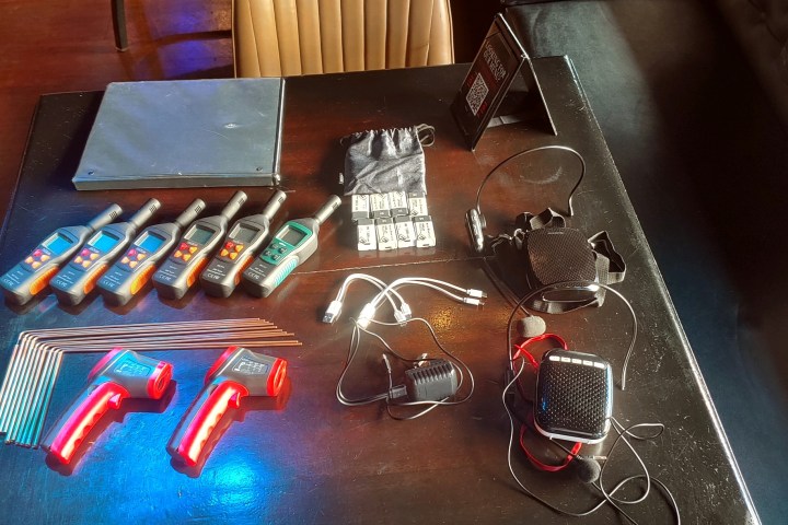 Ghost hunting tools on a table.